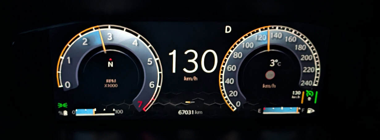 Close-up of Jeep Compass dashboard showing speed, RPM, and temperature.